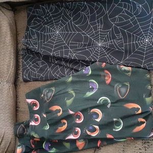 Fabulegs Halloween themed leggings size M, 1 eyes and 1 spiderwebs